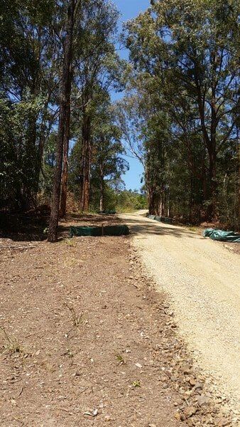 Road with Stones — Earthmoving Services  in Eungai Creek, NSW