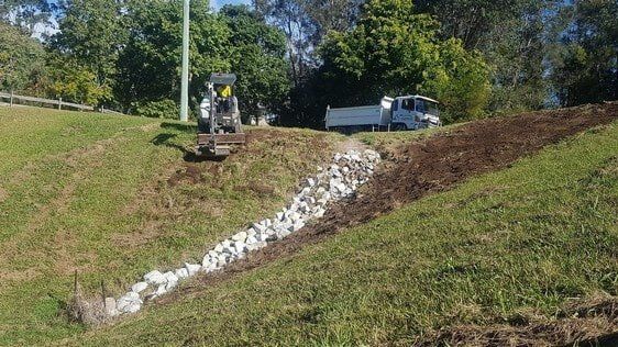 Truck Beside Road — Earthmoving Services  in Eungai Creek, NSW