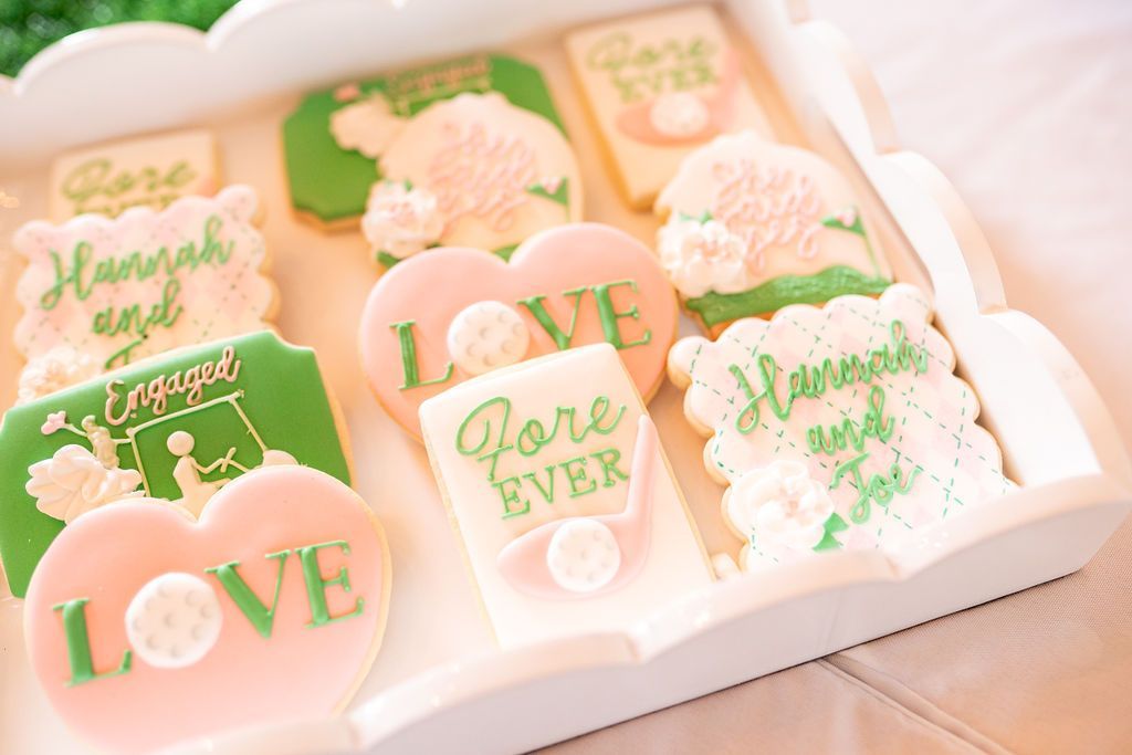 A tray of decorated cookies with the words `` love forever '' written on them.