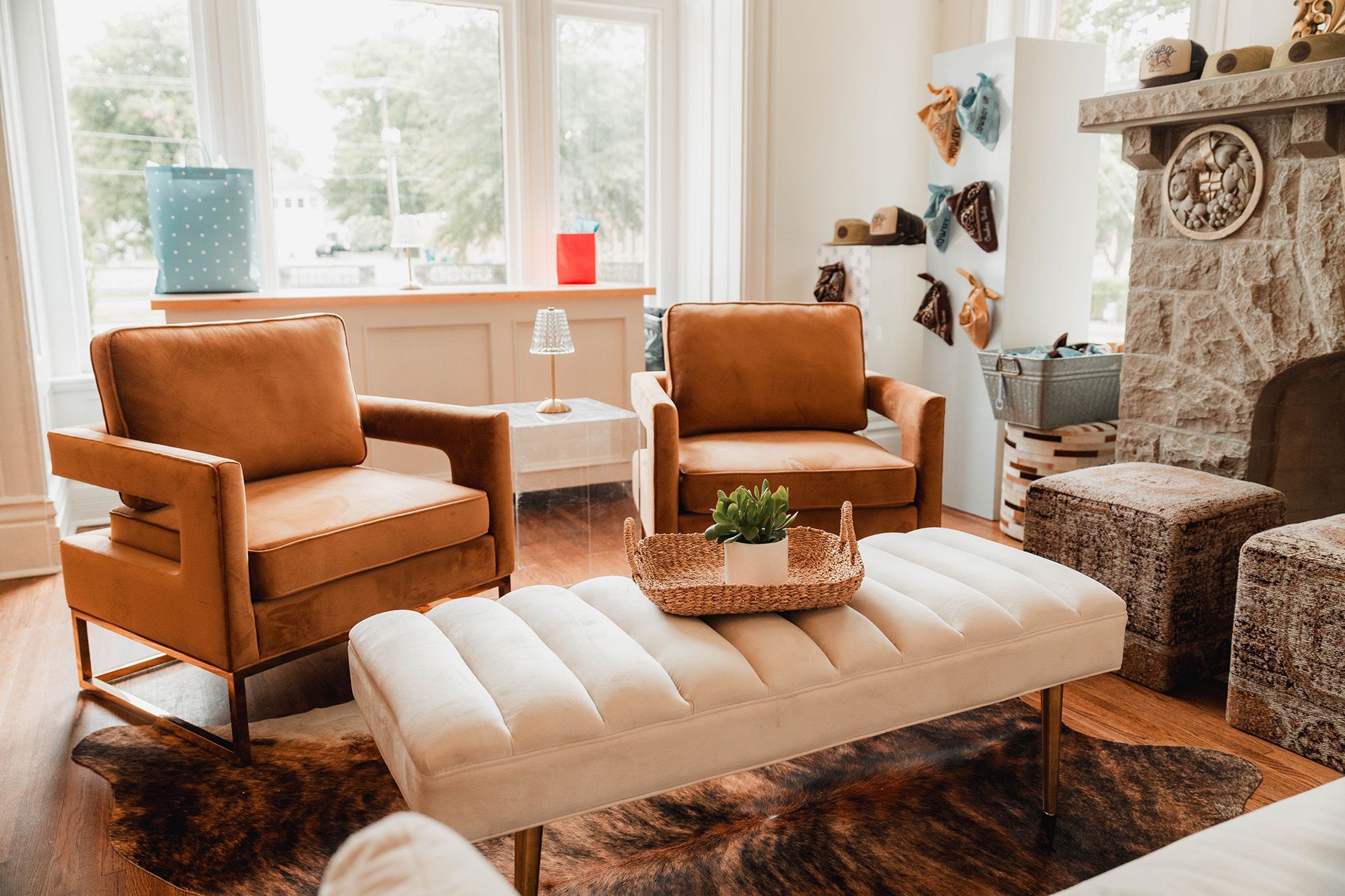 A living room filled with furniture and a fireplace.