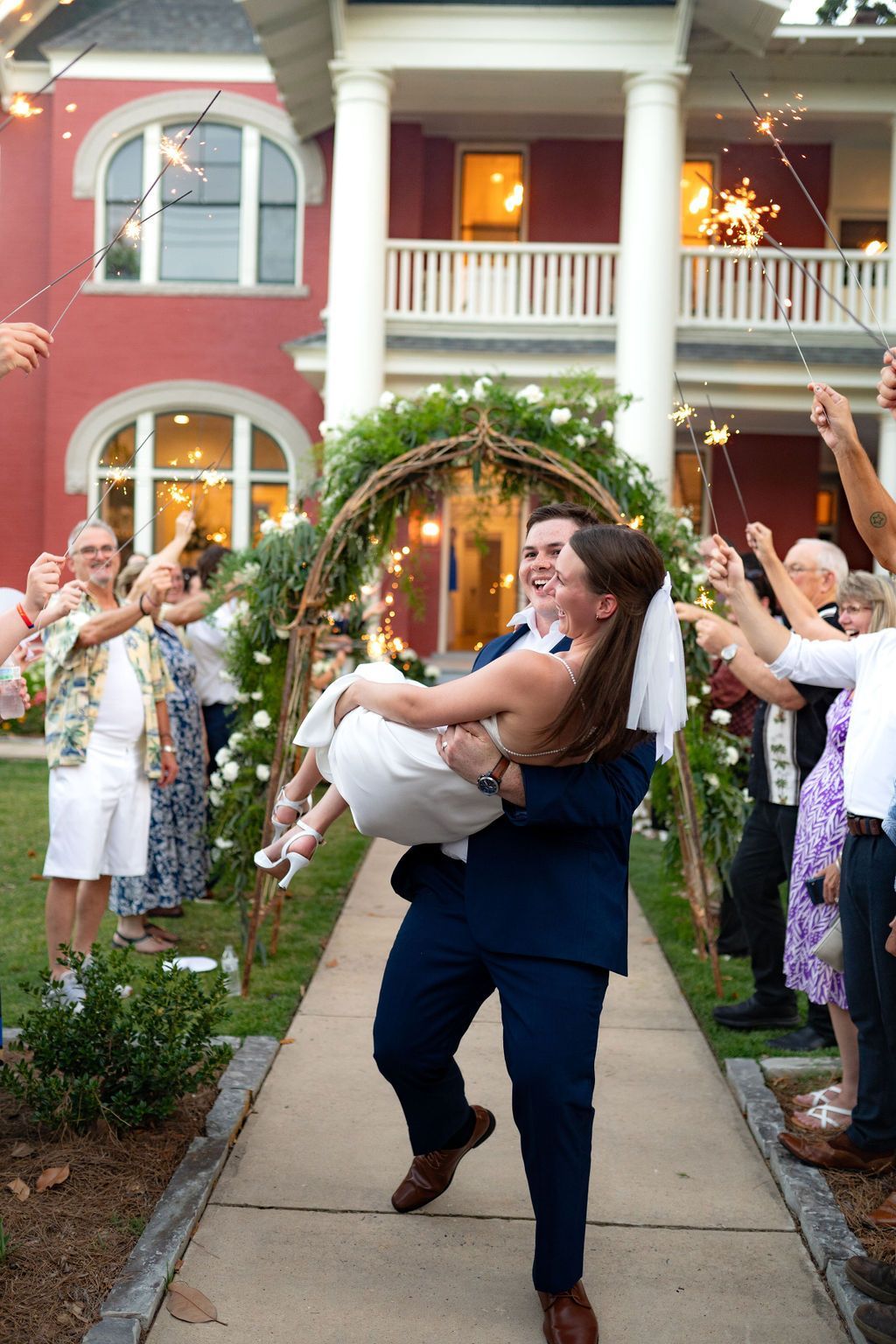 Newly married couple celebrating at the E.O. Manees House in North Little Rock, Ar