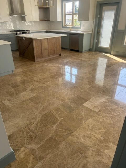 Exquisite marble floor installation in a custom home.