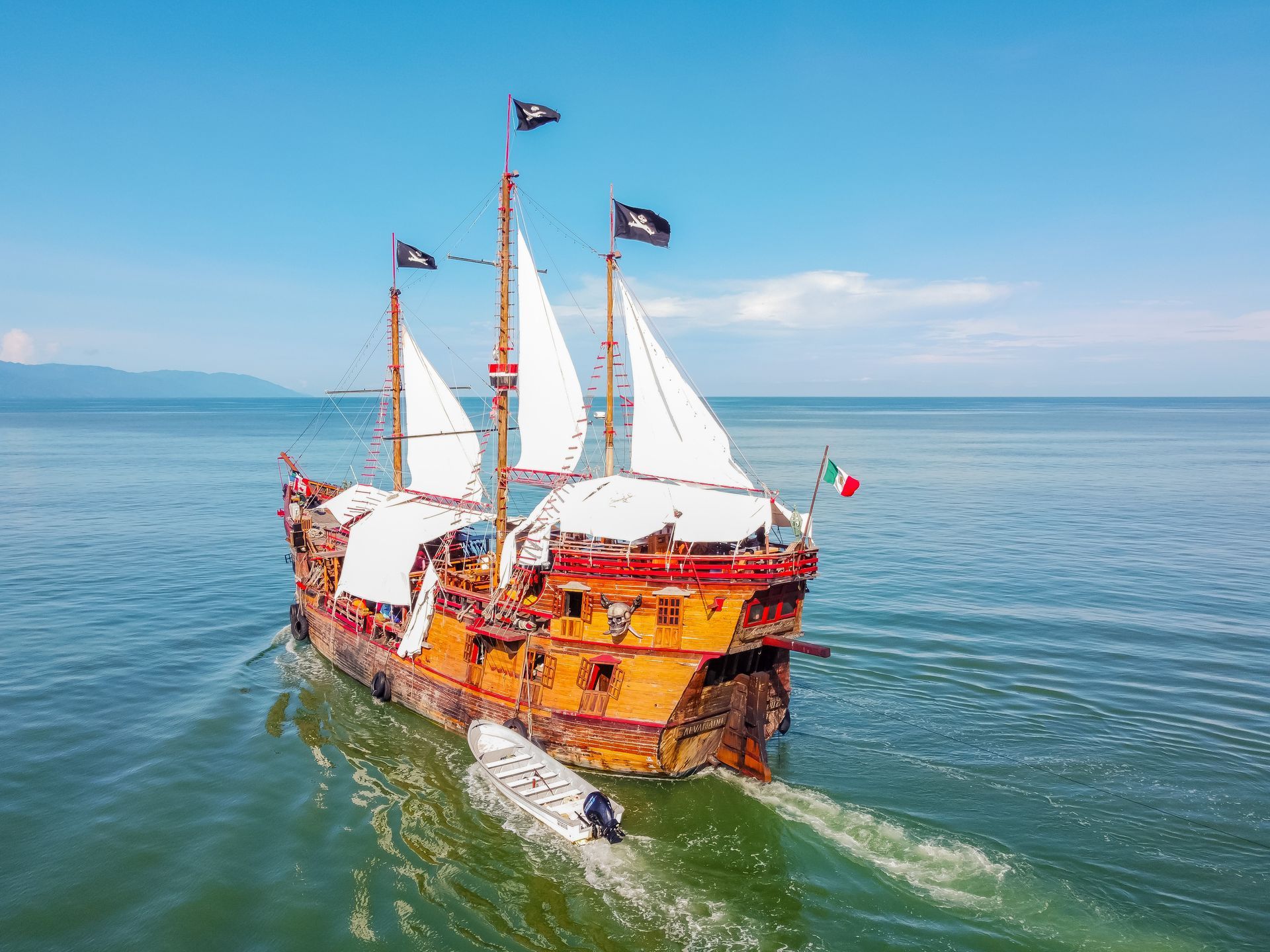 an aerial view of a pirate ship in the ocean .