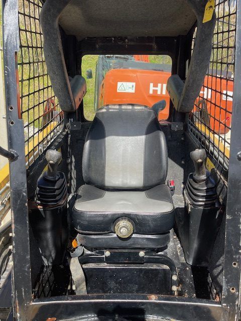 The inside of a hitachi skid steer loader
