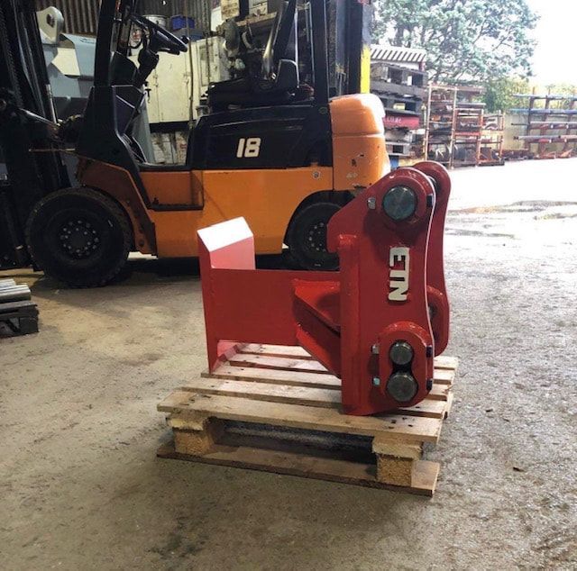 A red machine with the word etn on it