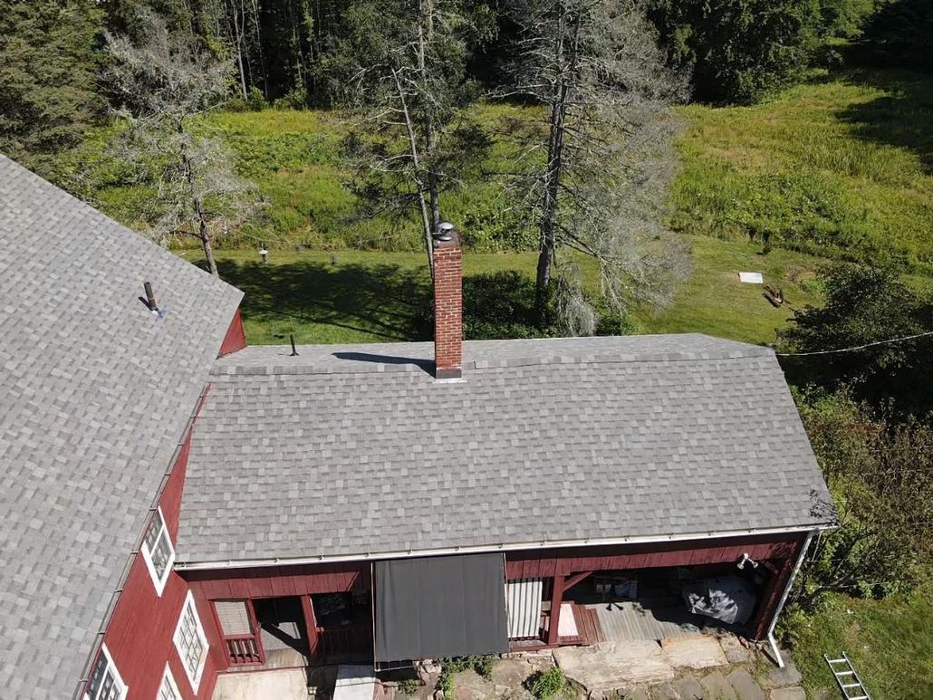 Red house grey roof. Roof replacement. Western Mass. Amherst