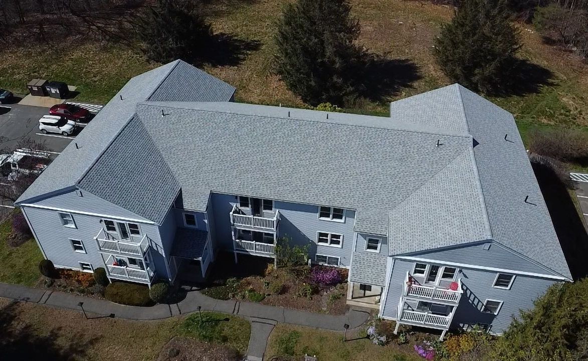 Completed roof replacement project showcasing quality work. Amherst MA.