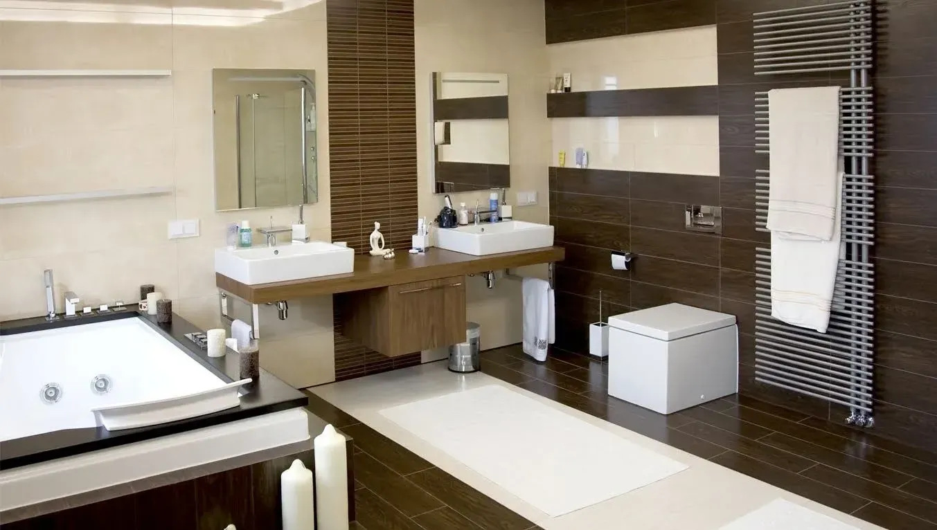 A bathroom with two sinks and a bathtub