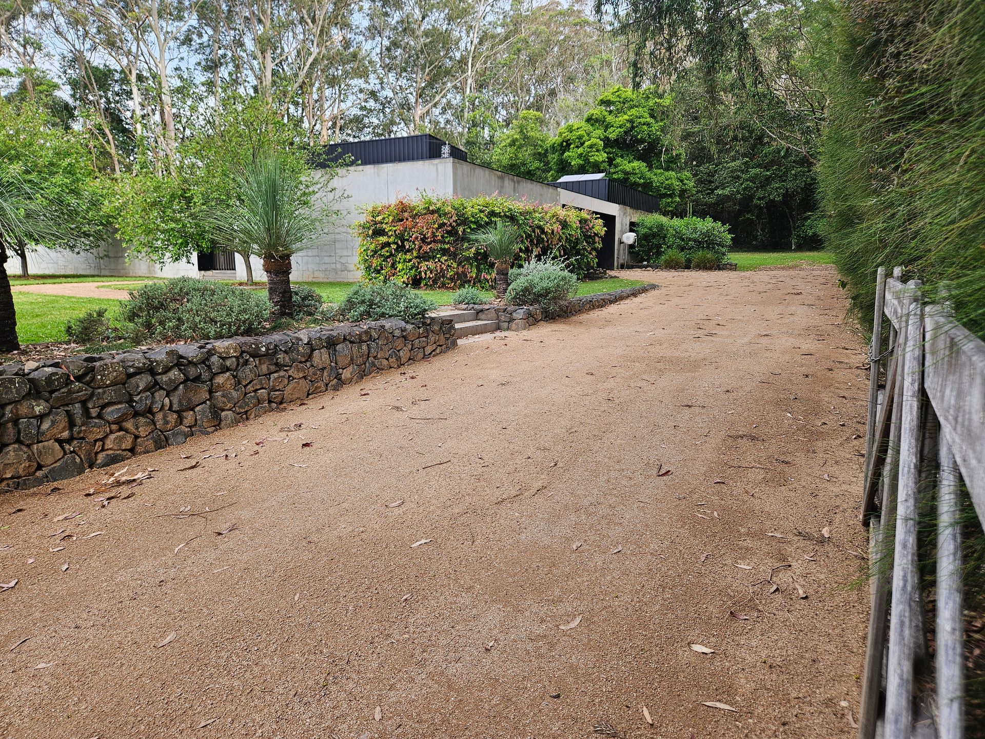 A volvo excavator is sitting on top of a trailer