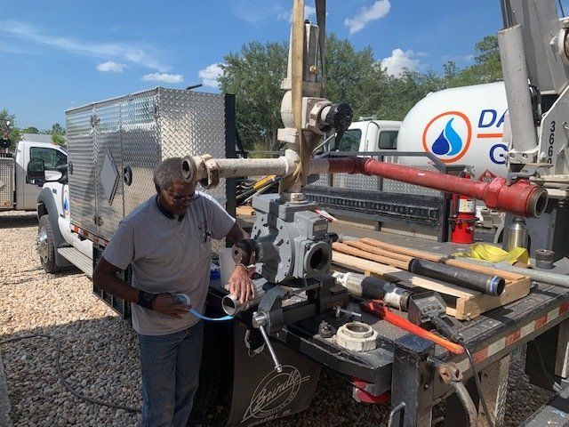 Male Repairing The Equipment For Gas Company - Gainesville, FL - Davis Gas Company Inc.