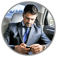 corporate executive looking at his phone