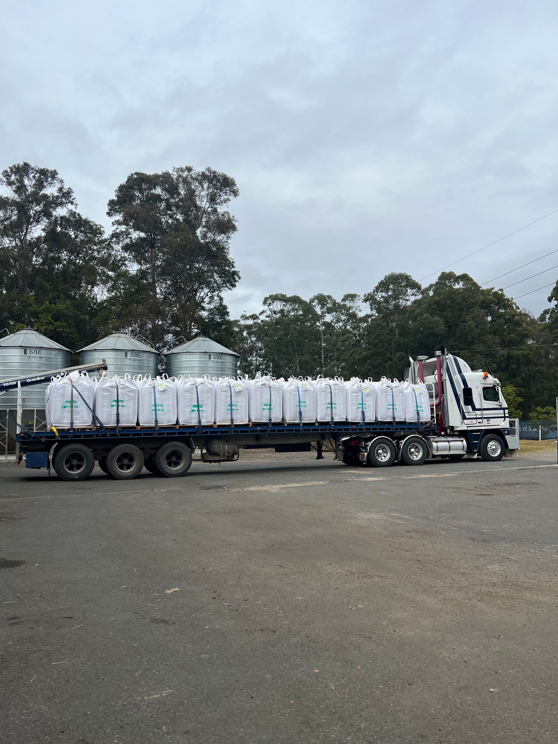 Semi-trailer Truck Loaded With Large White Bags — Prostoc In Macksville, NSW