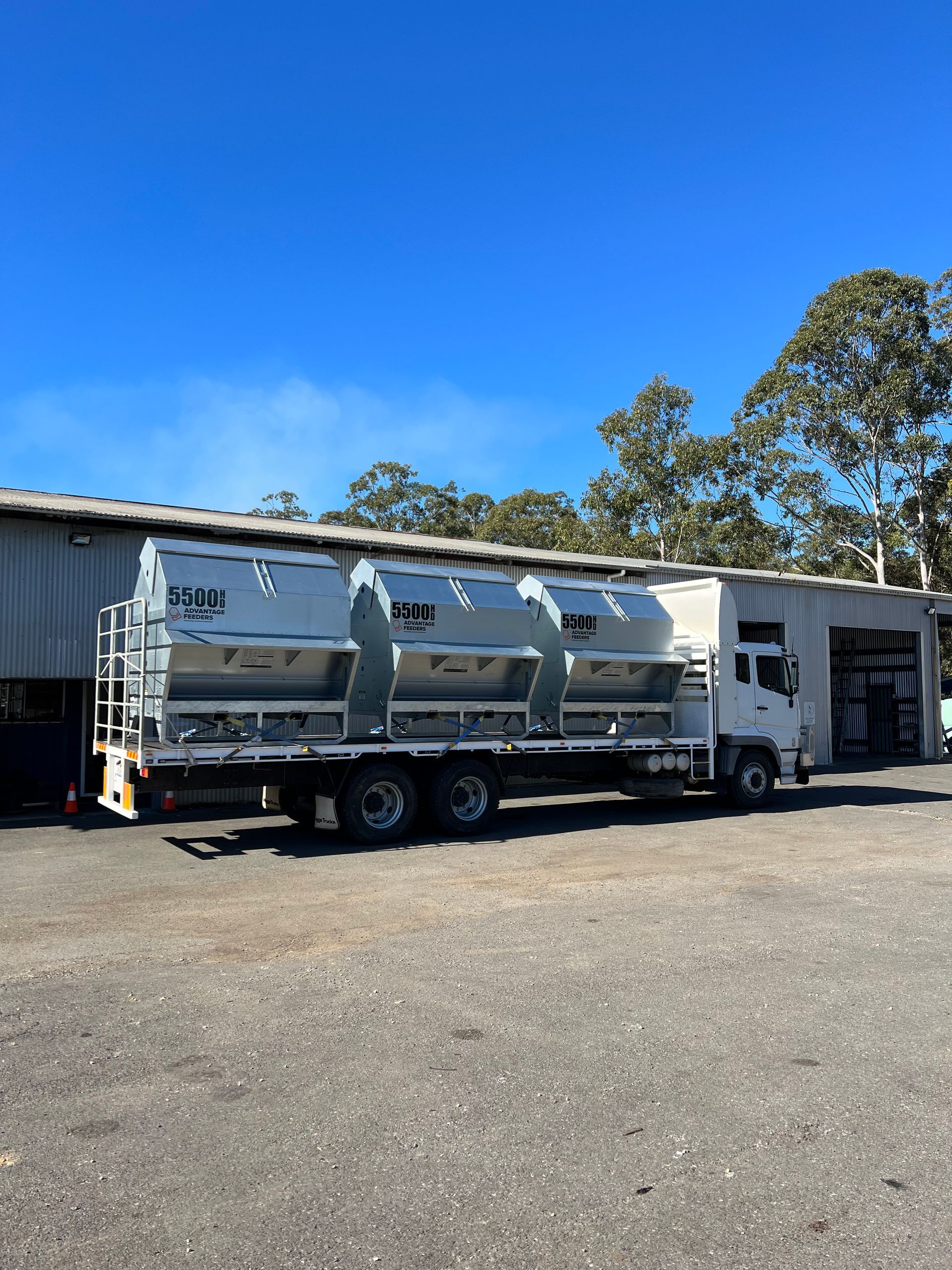 Truck Carrying Three Large Silver Containers — Prostoc In Macksville, NSW 