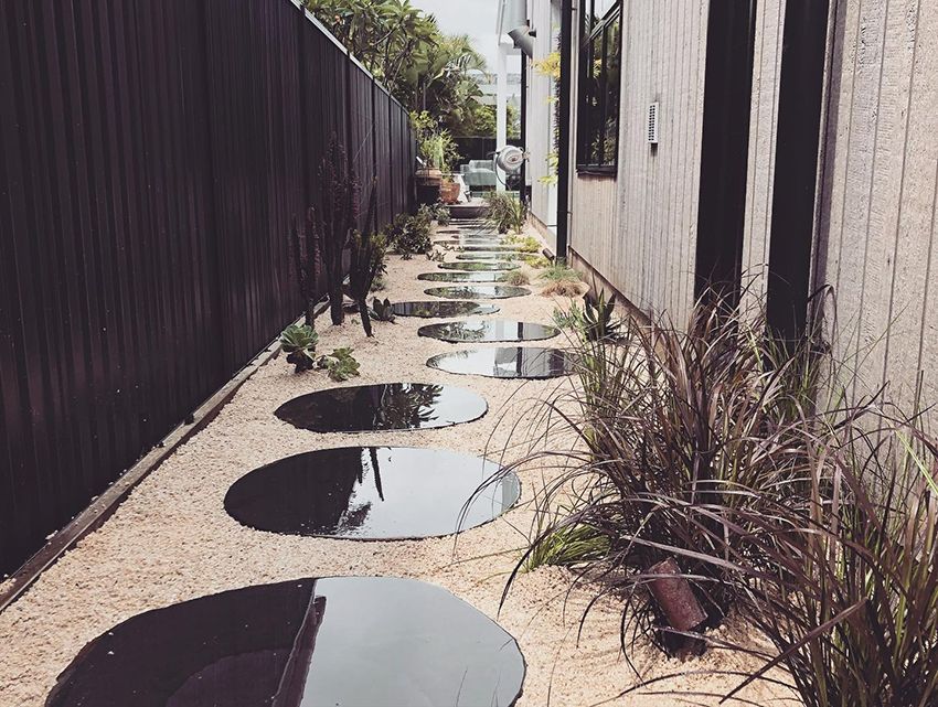A Walkway Leading to a House with a Fence and Steppingstones — HMJ Landscapes in Broadbeach, QLD