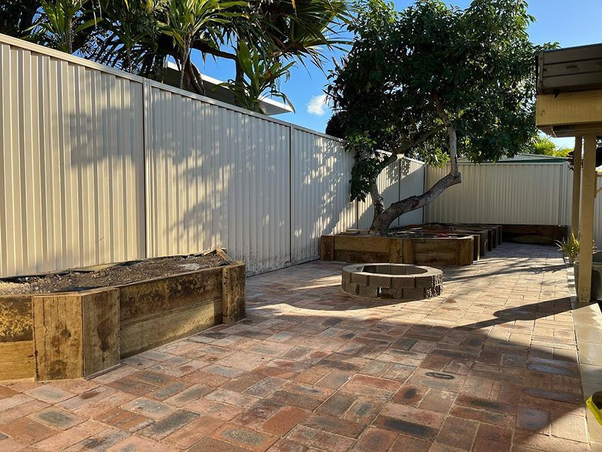 There is a Fire Pit in the Middle of the Backyard — HMJ Landscapes in Broadbeach, QLD