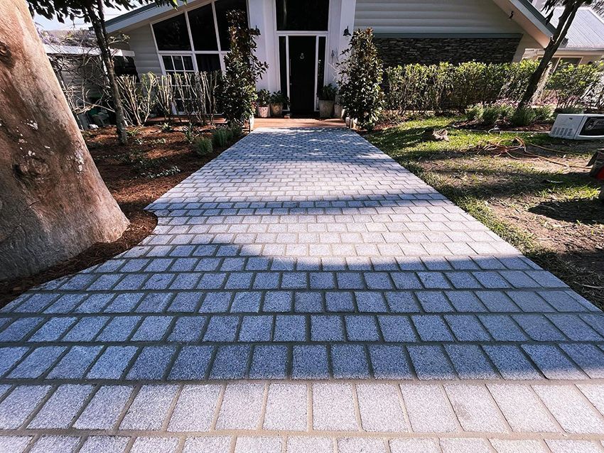 A Brick Walkway Leading to a House — HMJ Landscapes in Broadbeach, QLD
