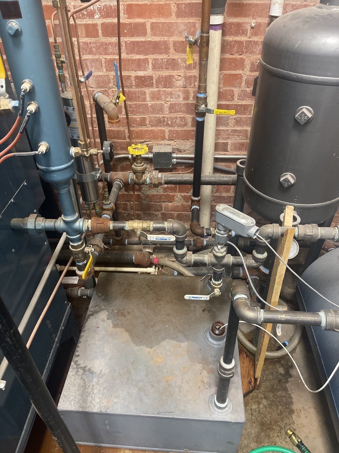 A steam boiler are connected to each other in a room