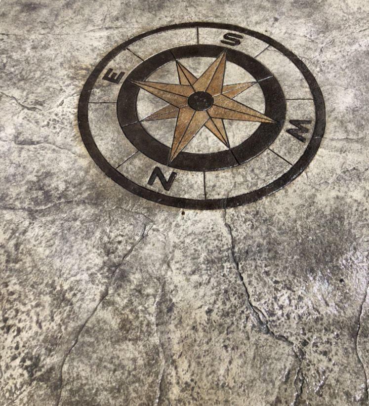 Intricate Concrete Compass Design