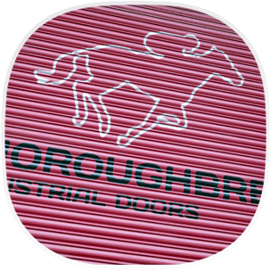 A red garage door with the Thoroughbred Industrial Doors logo