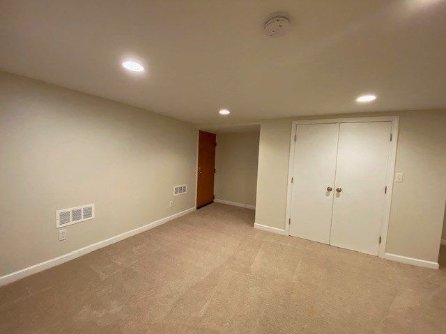Apartment F carpeted room — Vernon, CT — A1 Properties
