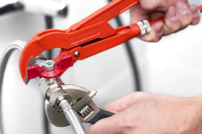 orange and gray wrench tool