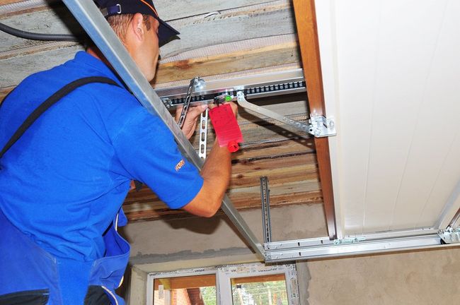 man repairing the ceiling