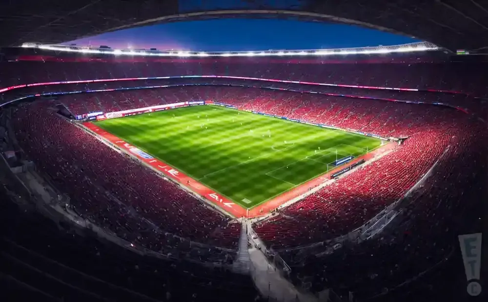 House of Worship AV soltuions. Audience in a dark auditorium; a stage with blue and purple lights, a 