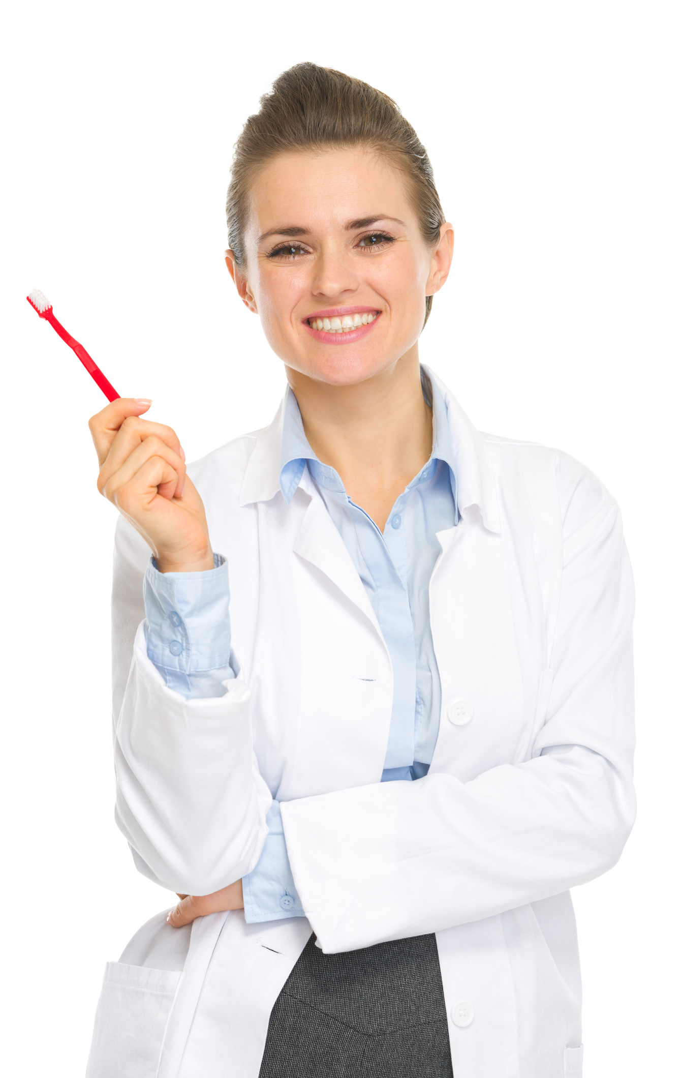 Woman in a lab coat holding a red pen, smiling and looking at the viewer.