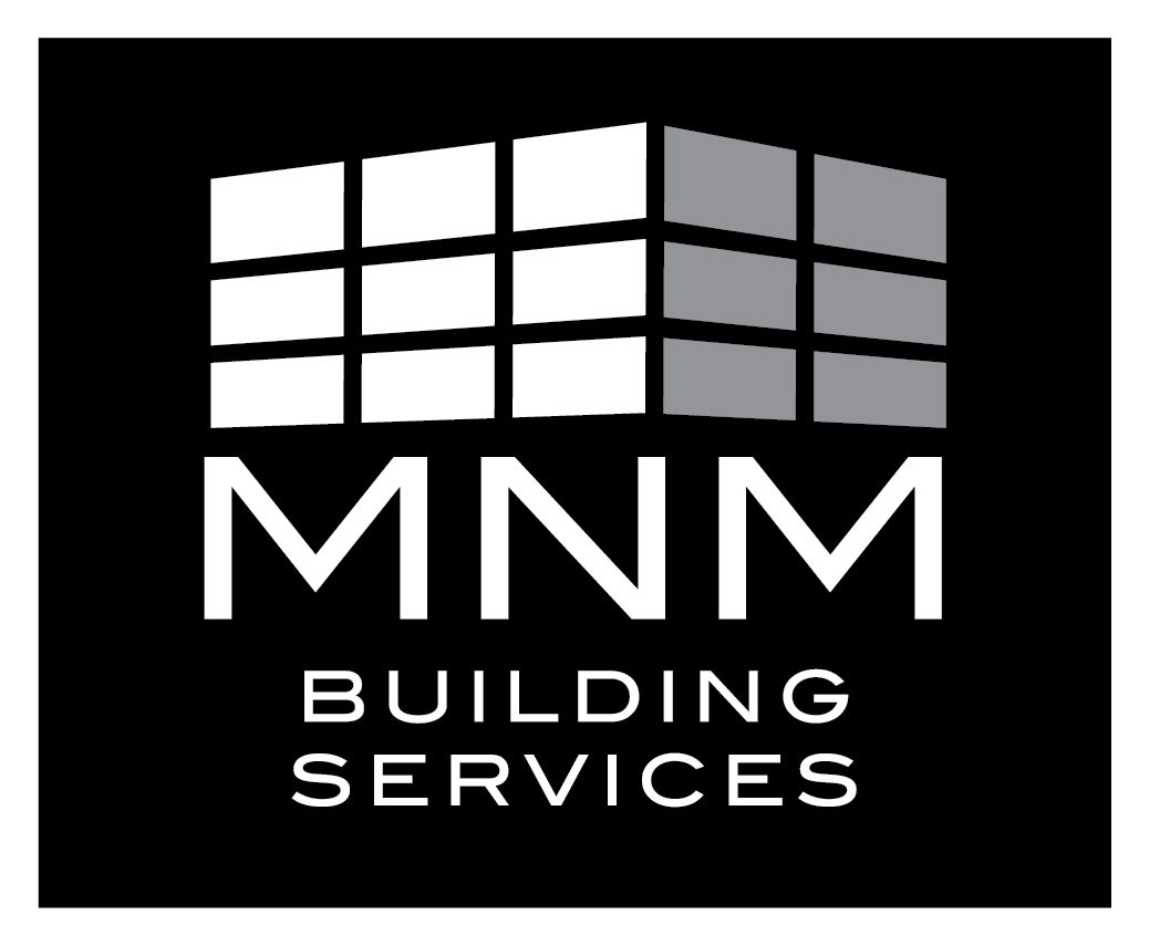 A black and white logo for mnm building services.
