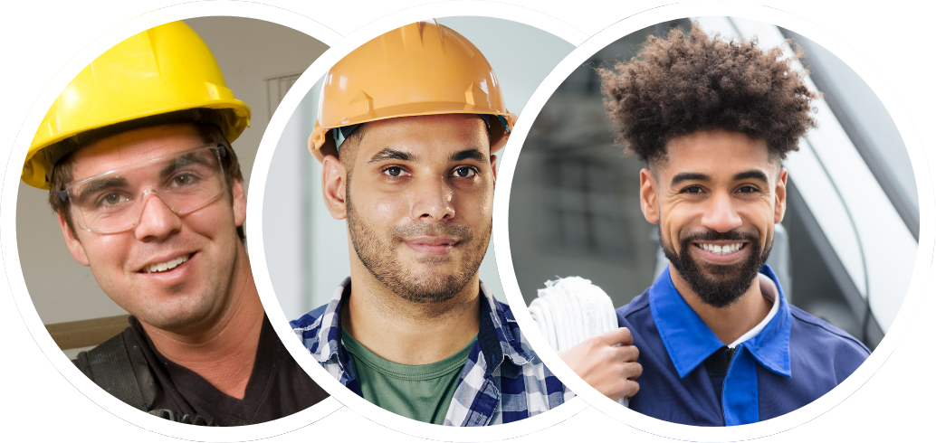 Three men are wearing hard hats and smiling for the camera.
