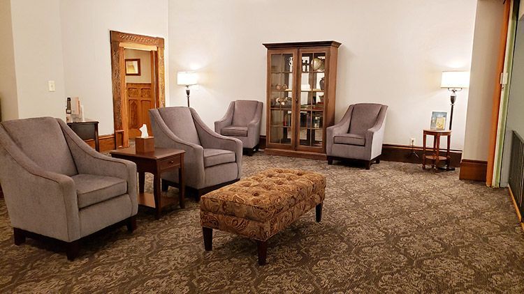 A living room filled with furniture and a coffee table.