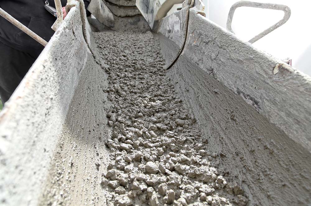 aggregate and concrete mix in a conveyor