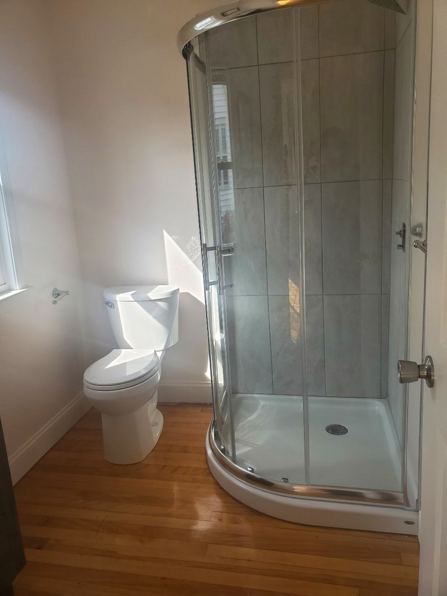A Bathroom with a toilet and a Shower Stall – Malden, MA – EG Remodeling LLC