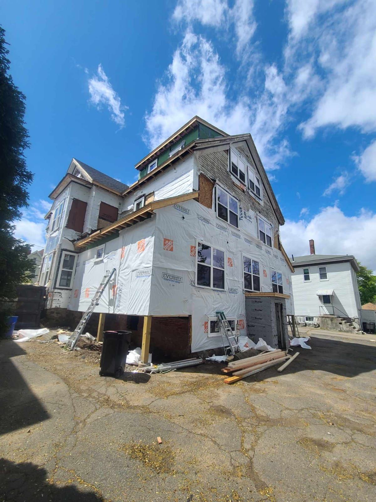 A Roof with a blue sky in the background – Malden, MA – EG Remodeling LLC