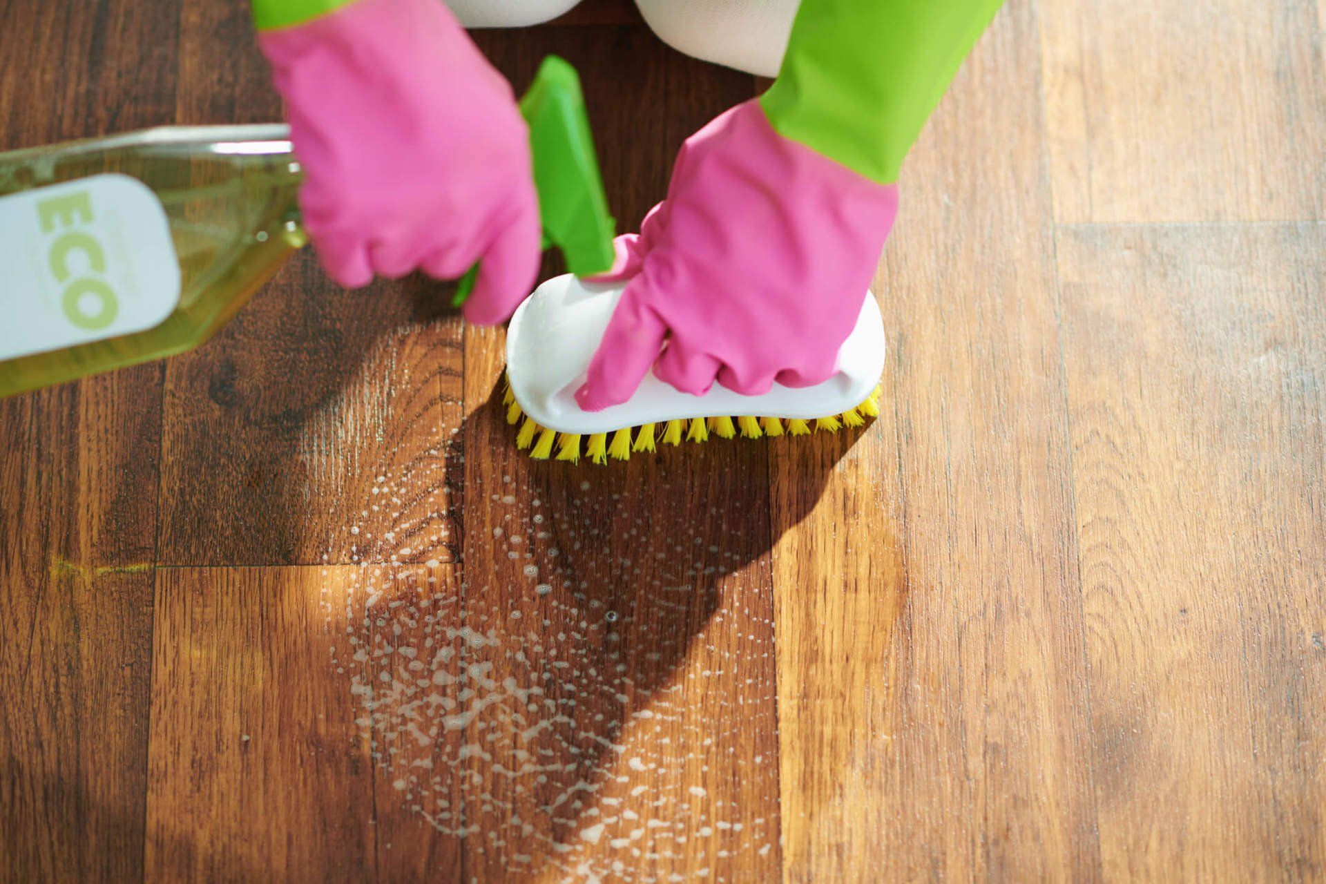 Woman Cleaning and Brushing Floor — North Myrtle Beach, SC — Williams Carpet Center