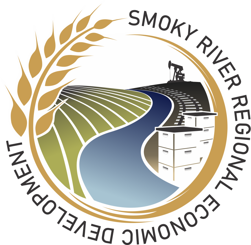 Circular logo featuring wheat, a winding river, an oil pumpjack, and beehives with the text