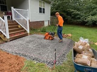 A Boy Doing Hardscaping Outside The House | Greensboro, NC | Premier Hardscapes