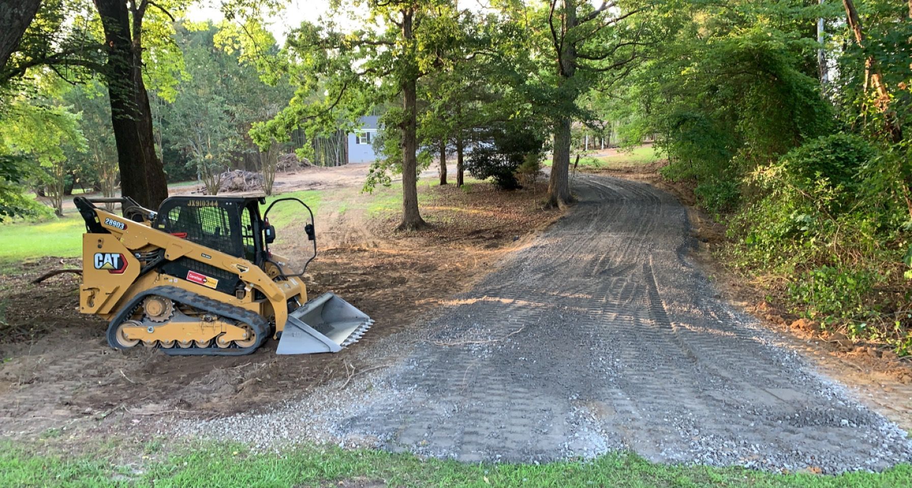 Land With Bulldozer | Greensboro, NC | Premier Hardscapes