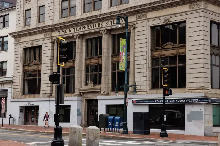 a building with a sign that says time & temperature