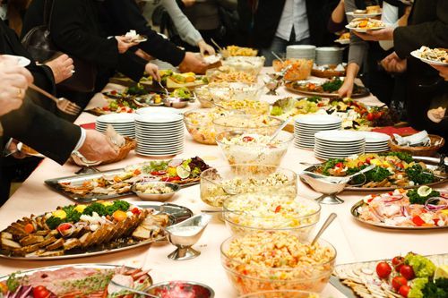 A Large Buffet Table Filled With Lots Of Different Types Of Food - Winston-Salem, NC - Legendary Catering