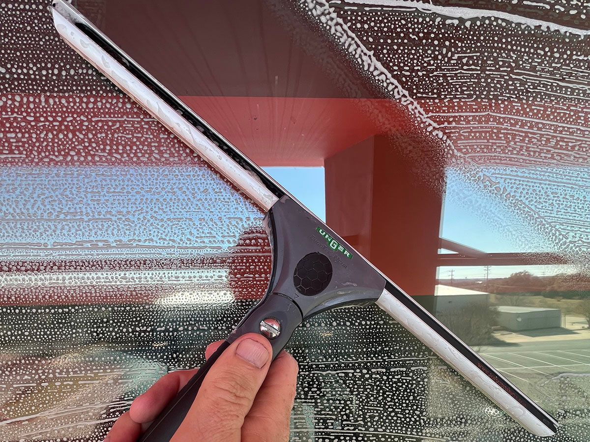 Squeegee used to get water from glass 