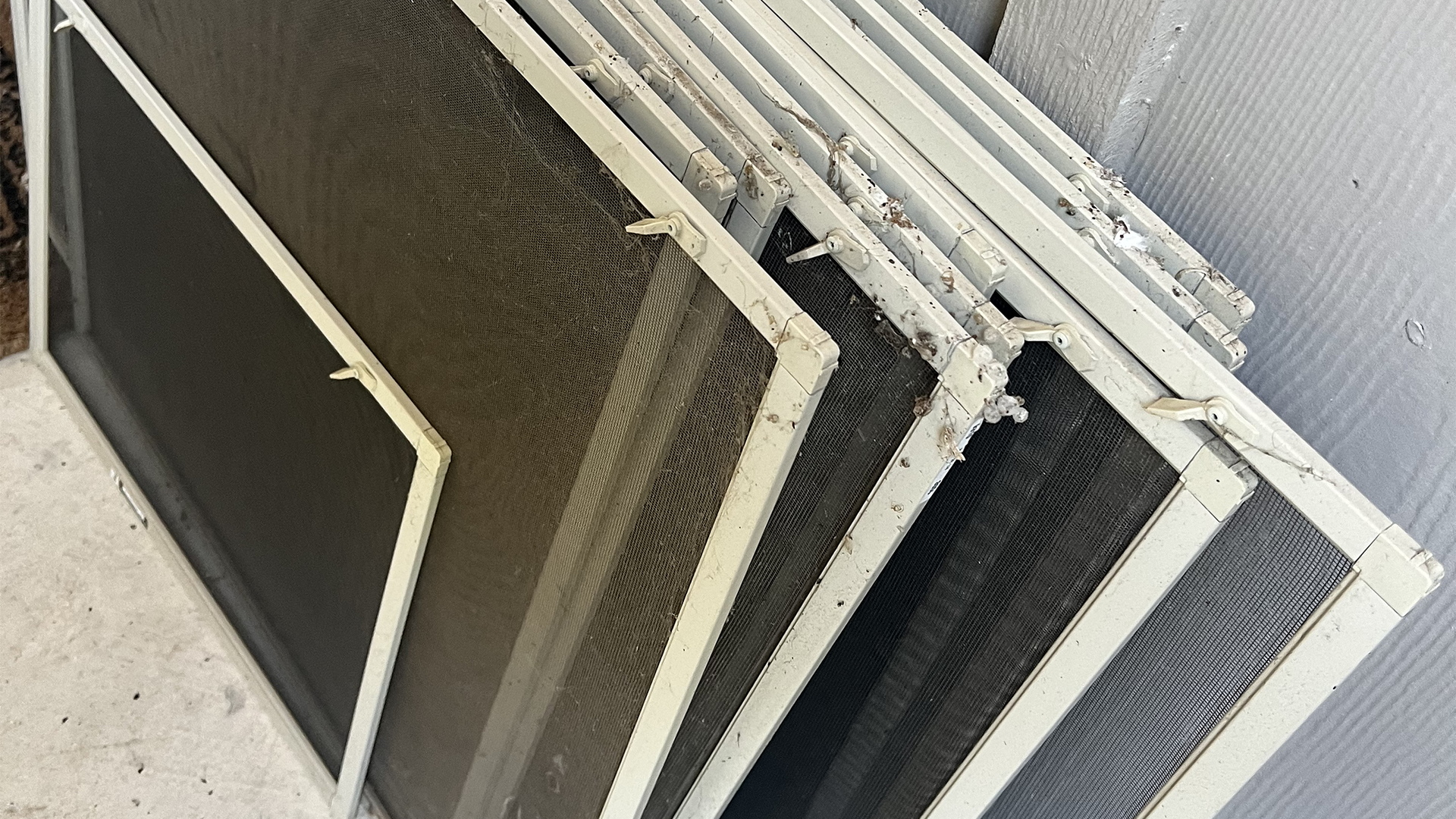 Dirty residential window screens