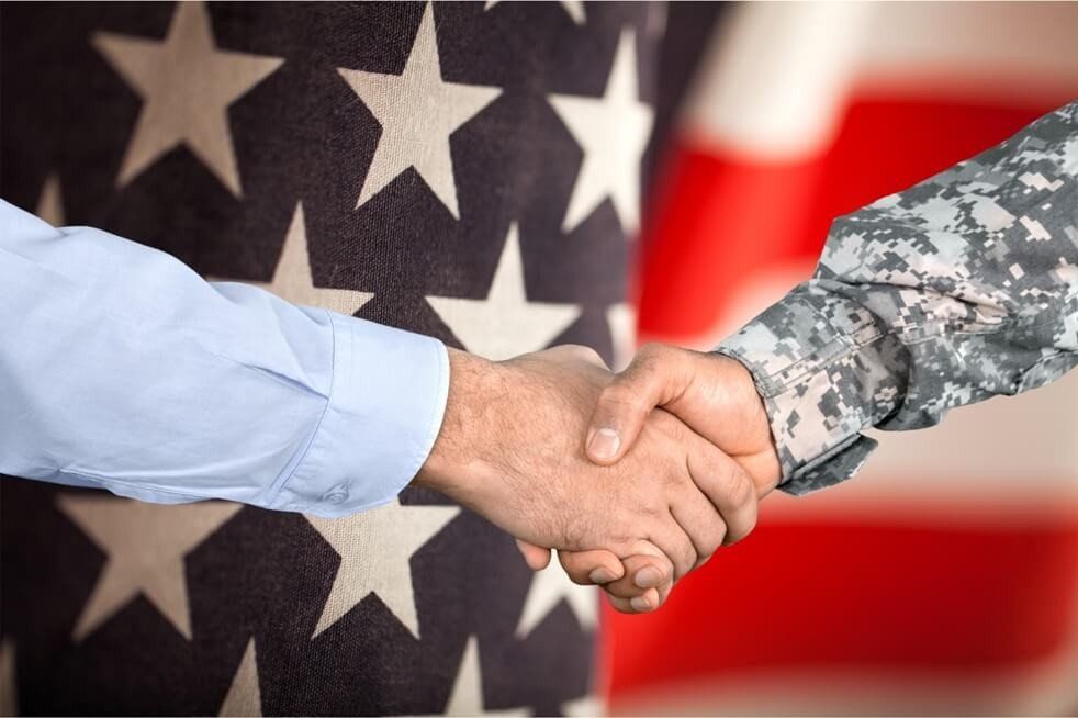 soldier shaking hands with realtor imagte