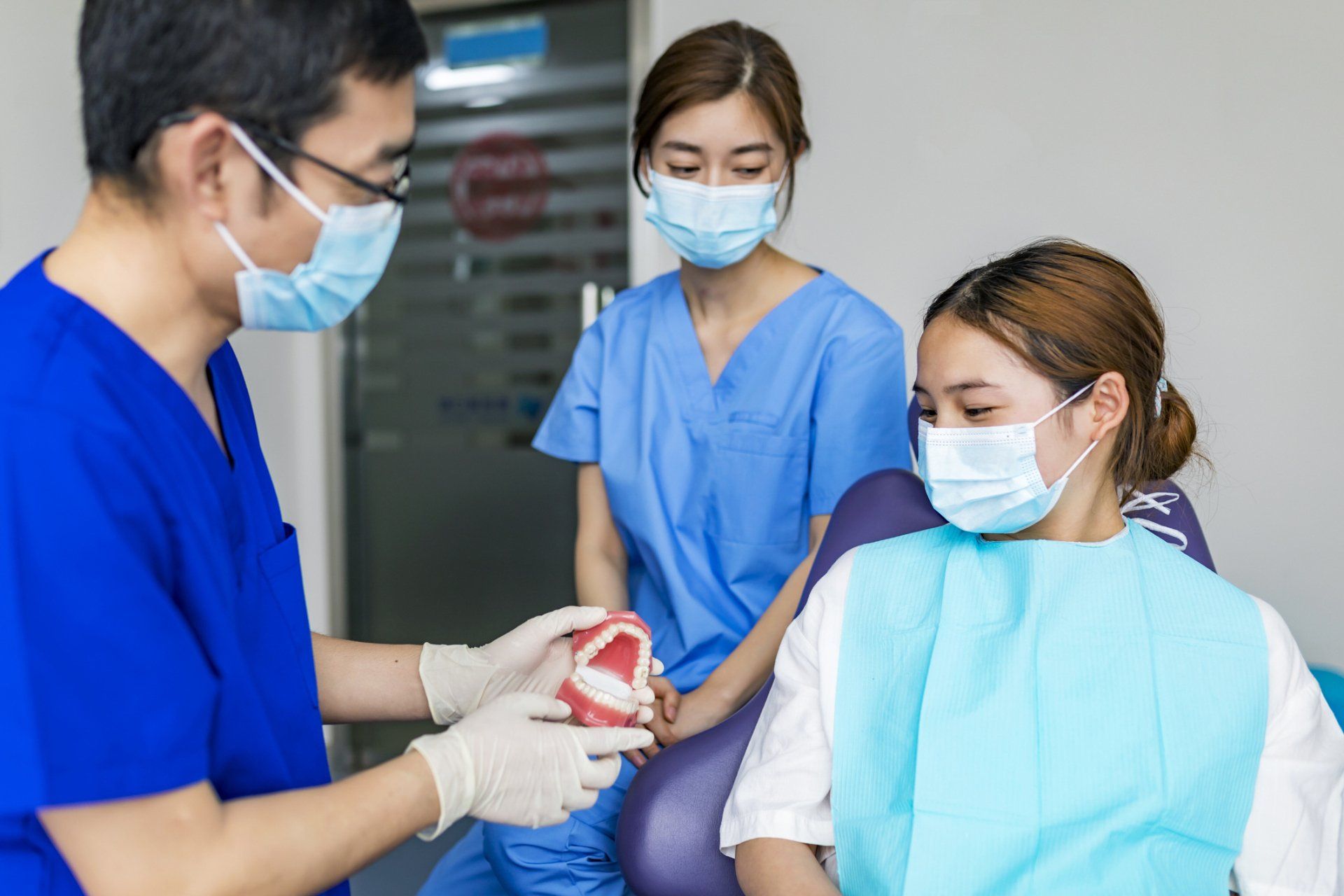 Dentist Explaining Tooth Restore Implant — Redding, CA — Robert L Dague, DDS
