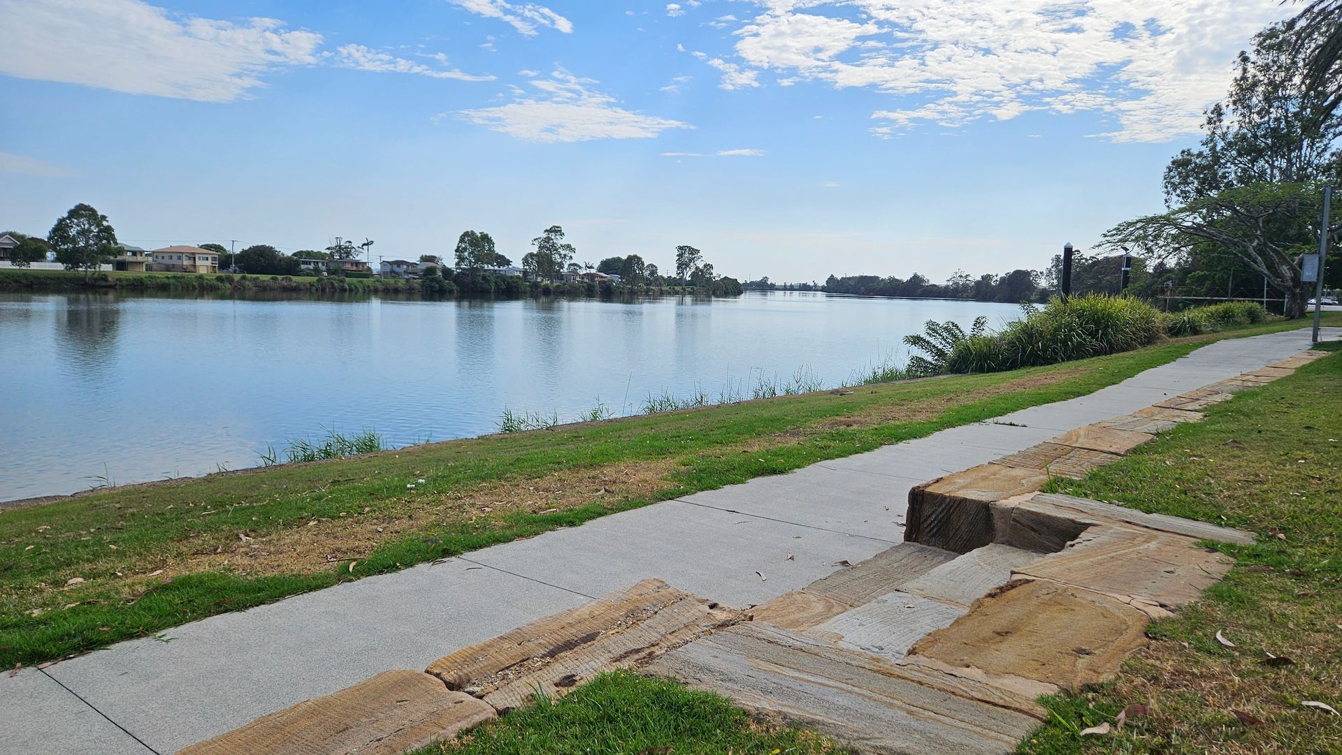 A  River With a Walking Path on the Right — Arborist Servicing in Woodburn, NSW