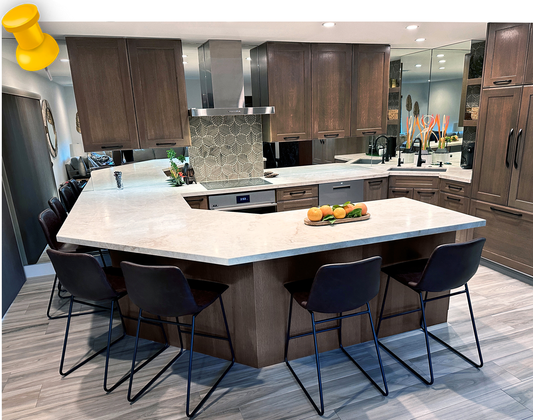 a kitchen with stainless steel appliances and wooden cabinets