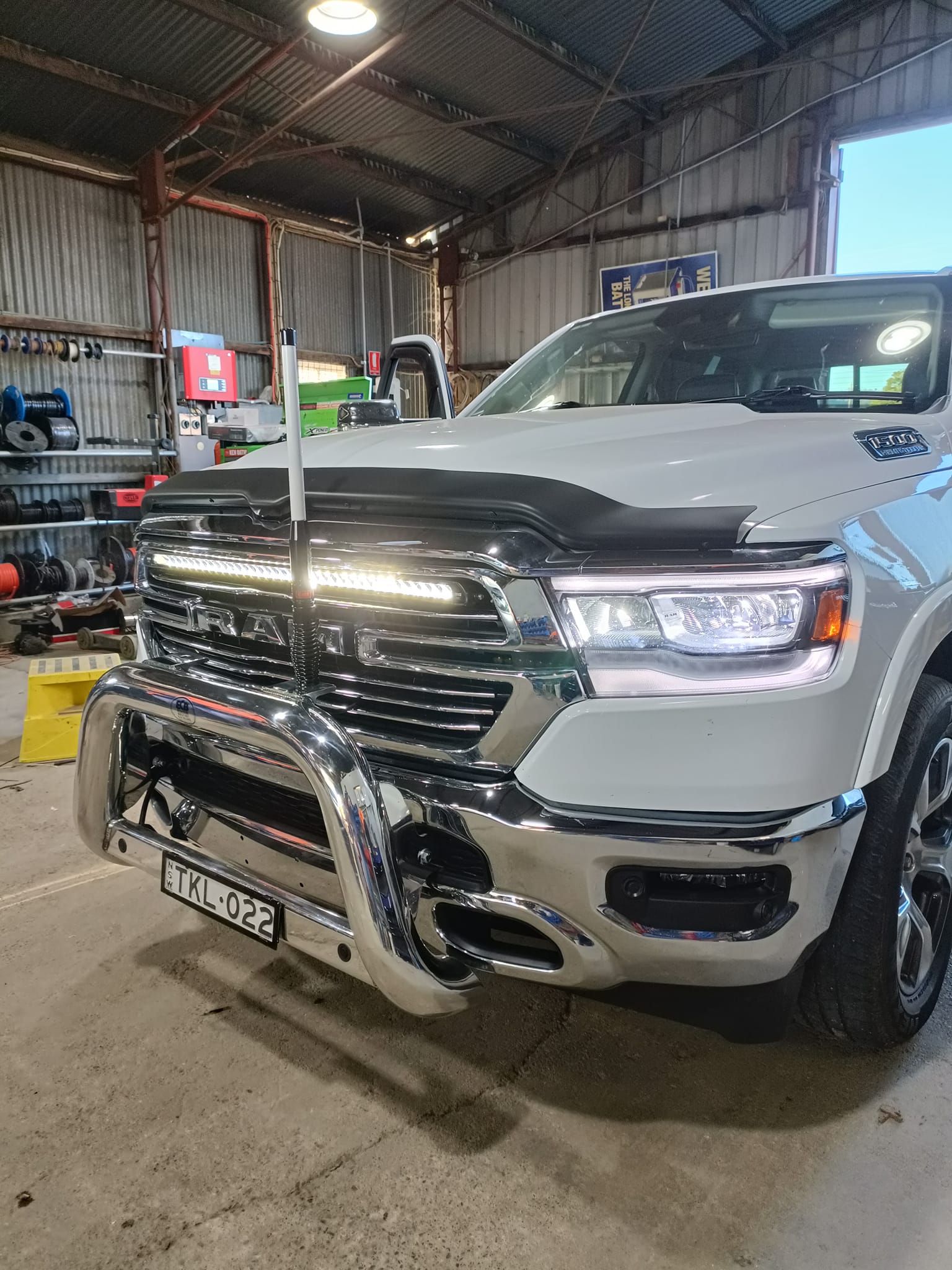 White bus inside the repair shop — Auto Electrical & Air Conditioning in Tamworth, NSW