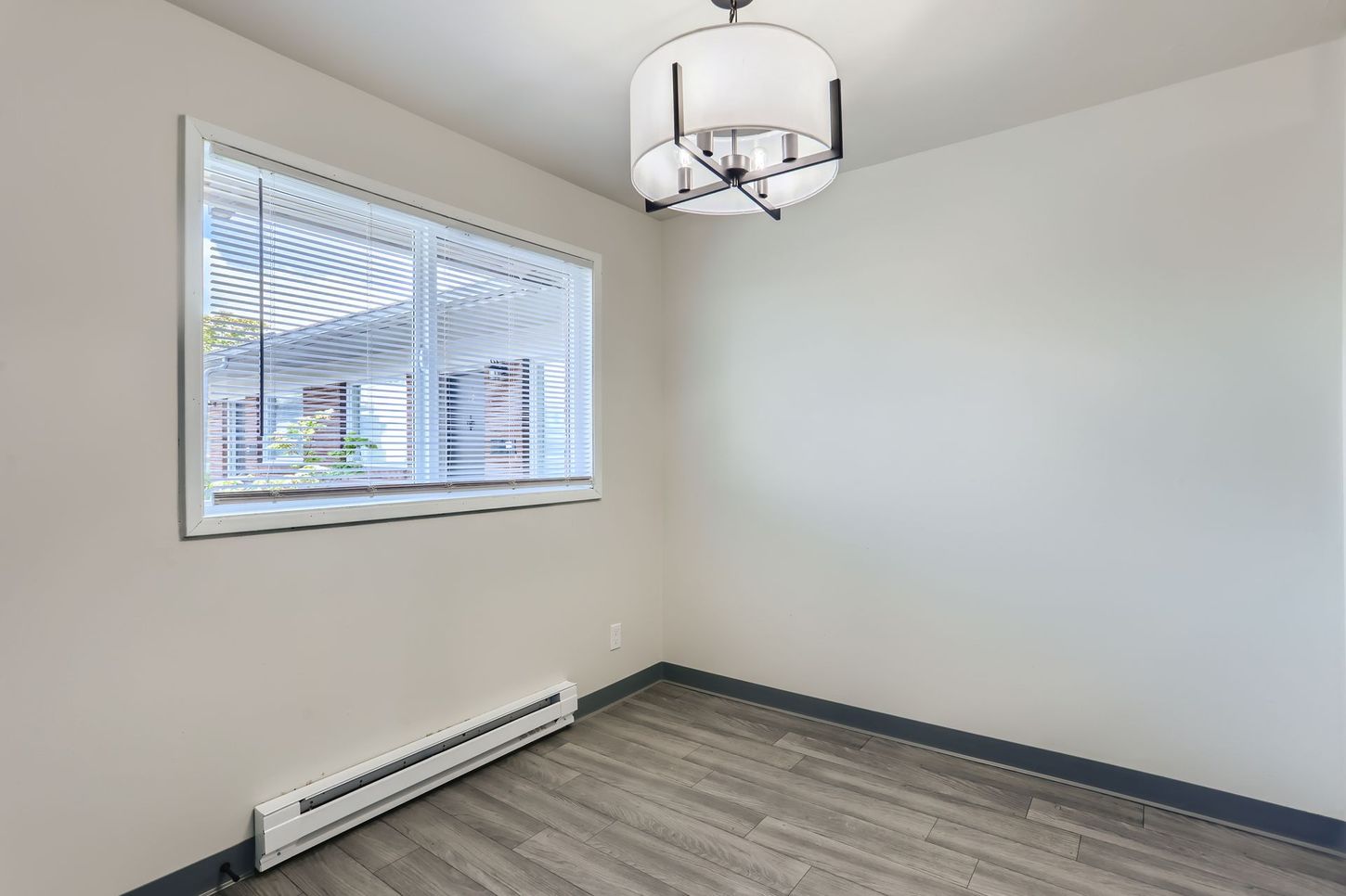 Photo showing a large bedroom window