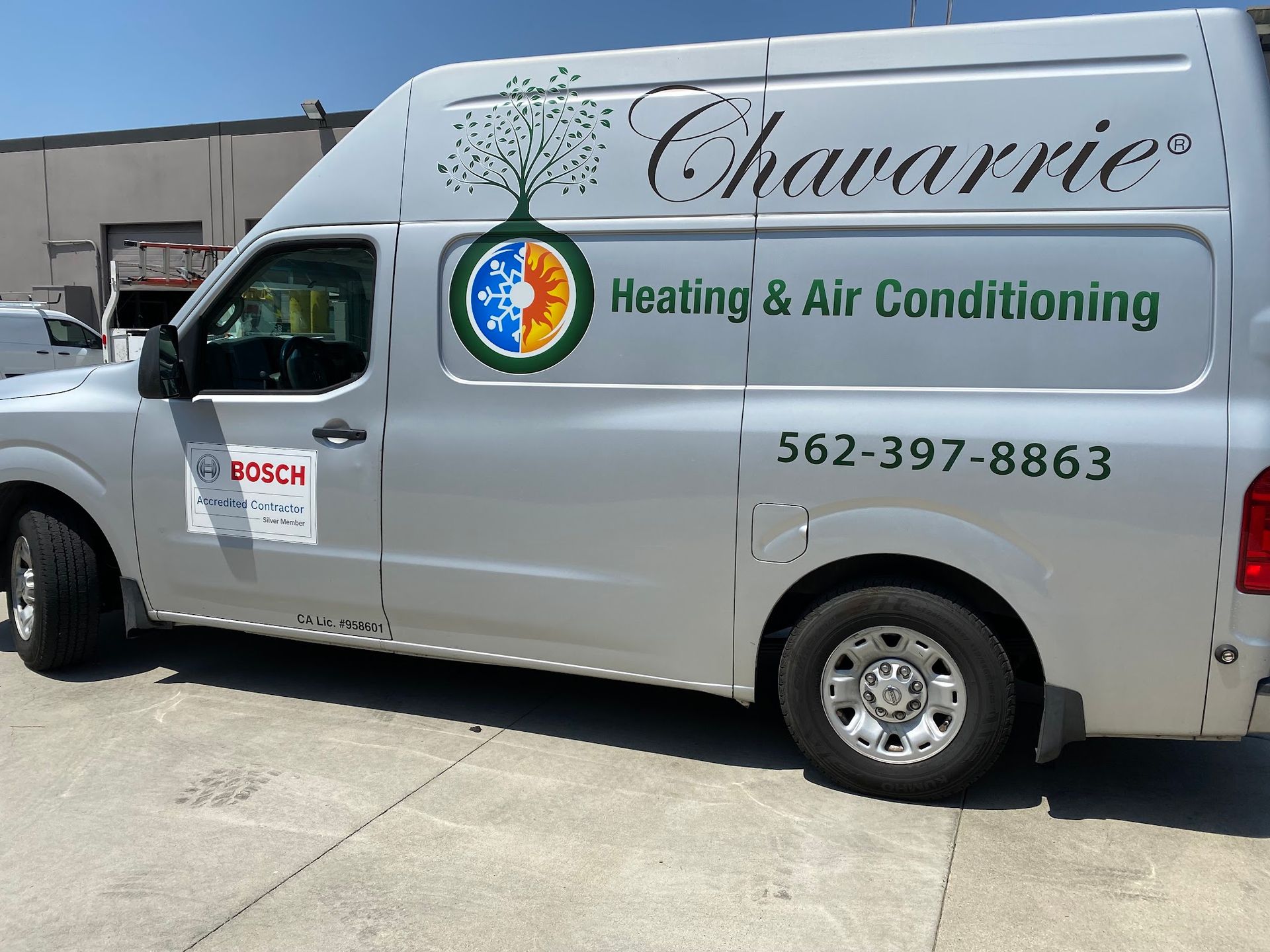Silver van with Chavarrie Heating & Air Conditioning logo and phone number.