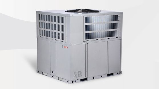 Large, box-shaped industrial HVAC unit with side vents and a central fan. Gray exterior against a white background.